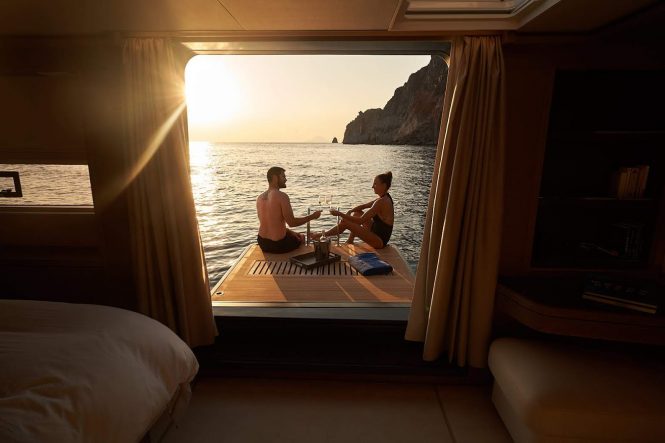 Fold-out swim platform or terrace from the master stateroom