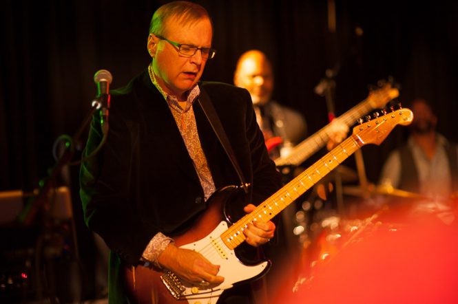 Paul Allen was an accomplished musician. Seen here playing the guitar