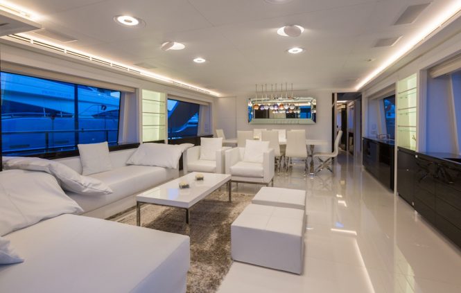 Inviting saloon with large windows and light contemporary decor