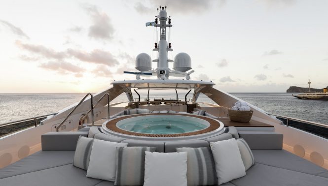 Jacuzzi on the sun deck with plenty of space to sunbathe and relax