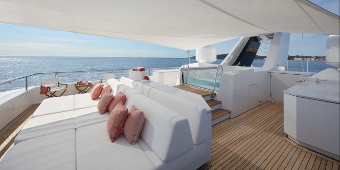 Jacuzzi and lounging area on top deck