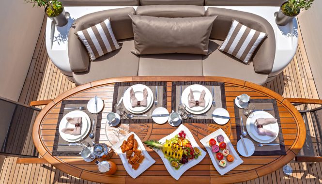 Alfresco dining set up for a refreshing summer breakfast, lunch or dinner under the stars