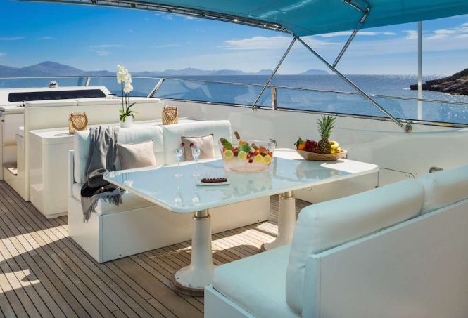 Alfresco dining set up on flybridge