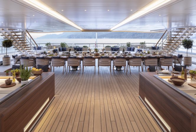 FLYING FOX offering expansive exterior deck areas including this amazing alfresco dining area - Photo © Guillaume Plisson for Imperial