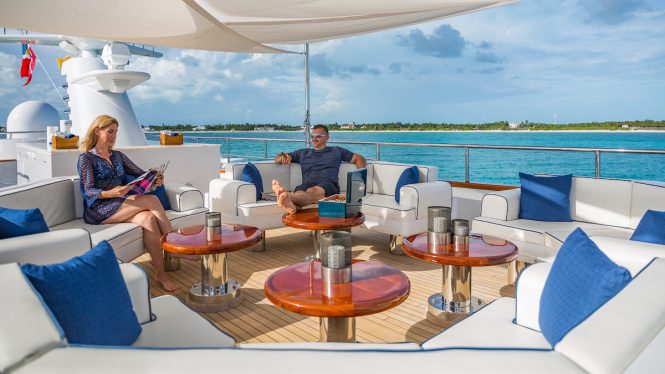 Enjoying a charter vacation on the sun deck