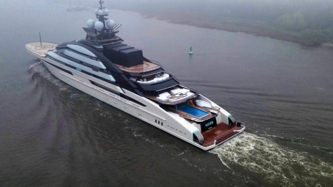 aft view showcasing the yacht's swiming pool and great deck areas © DrDuu