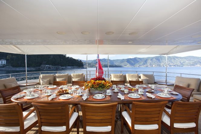 alfresco dining set up on aft deck