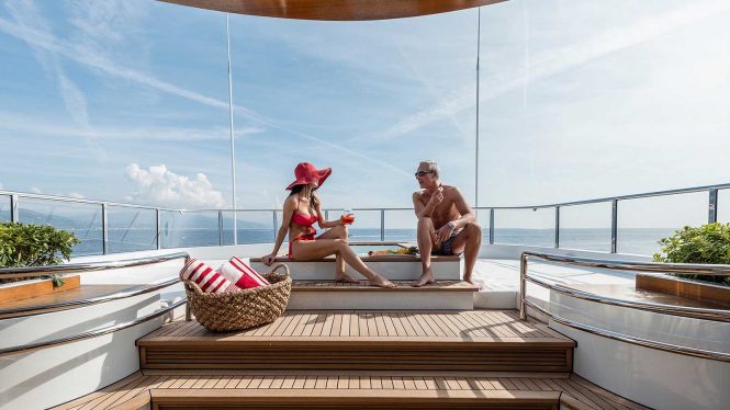 Enjoying the Jacuzzi and the sunshine on superyacht charter