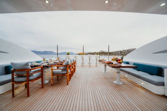 Sun deck with alfresco dining and bar
