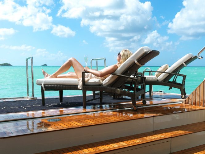 Sunbathing in style transom beach club