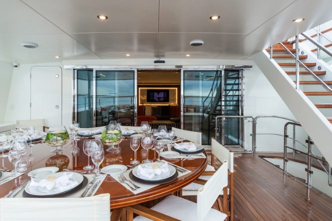 Upper deck aft al fresco dining setting