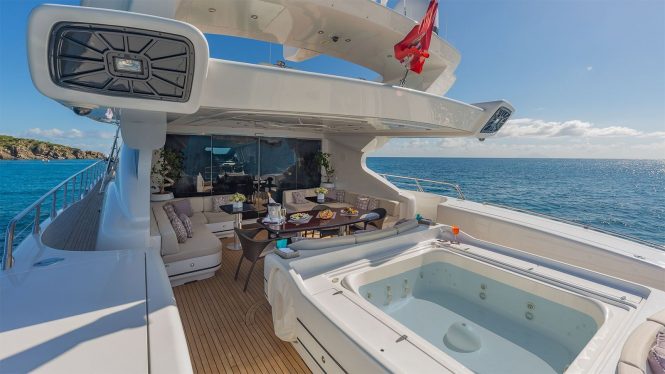 Jacuzzi and dining area on aft deck