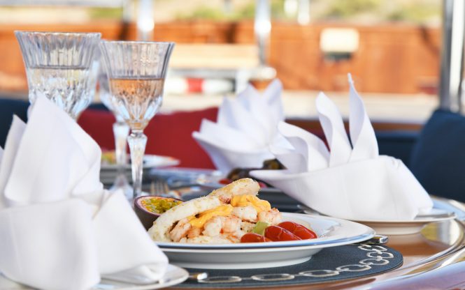 Elegant dining aboard the sailing yacht