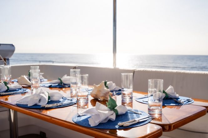 Deck dining table set for dinner