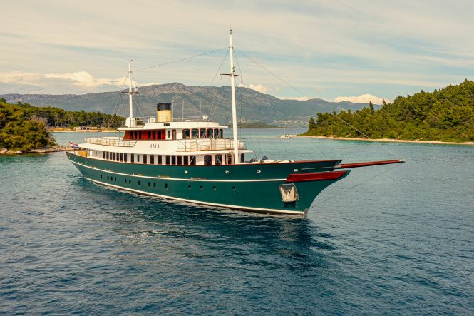 Look out for motor yacht MAIA's distinctive good looks and yellow funnel