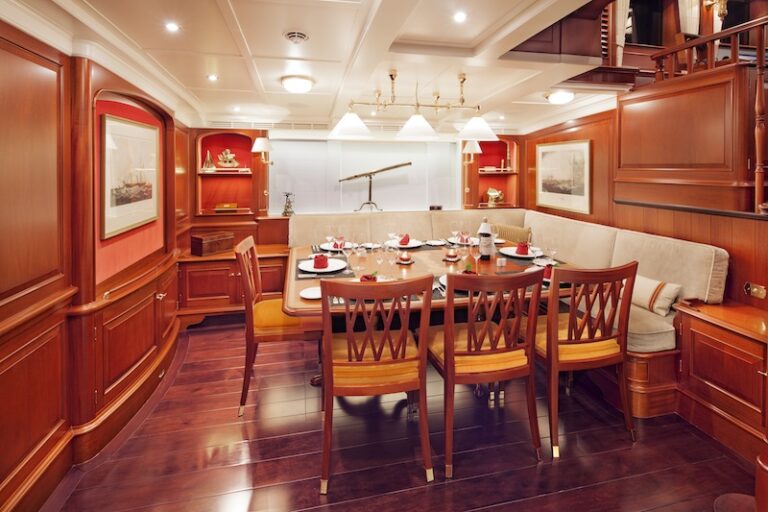 16 Kamaxitha ketch - lower salon and dining area - Photo by Cory Silken