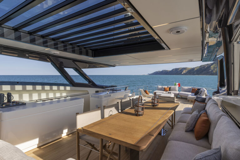 Dining under louvred bimini