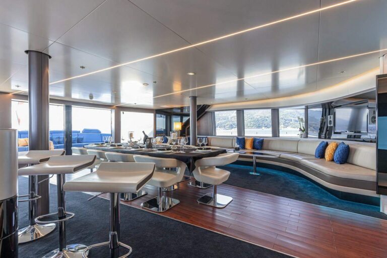 Main salon with bar - view aft