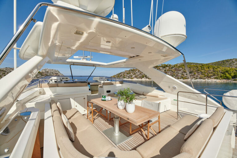 Lounge And Deck Helm On Flybridge Deck