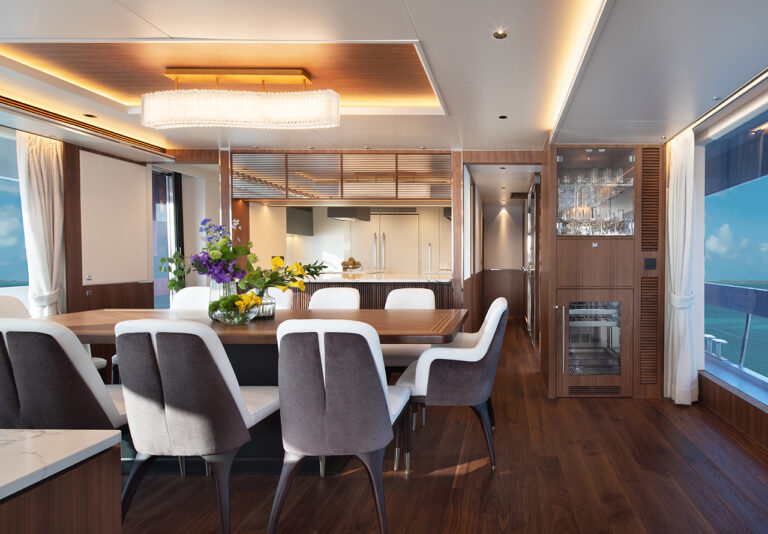 Main Salon Dining With View Into Open Galley