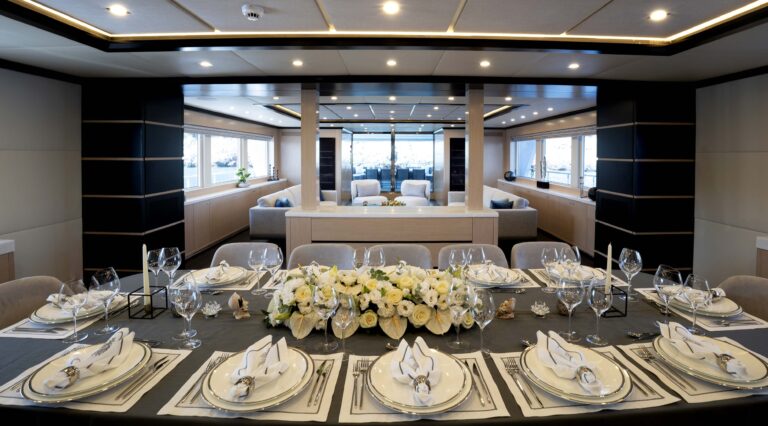 Main Salon Dining - Table Set For Dinner
