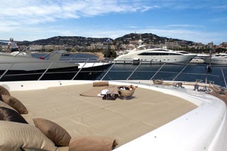 Fore Deck Sun Bathing Aboard Yacht VOYAGE