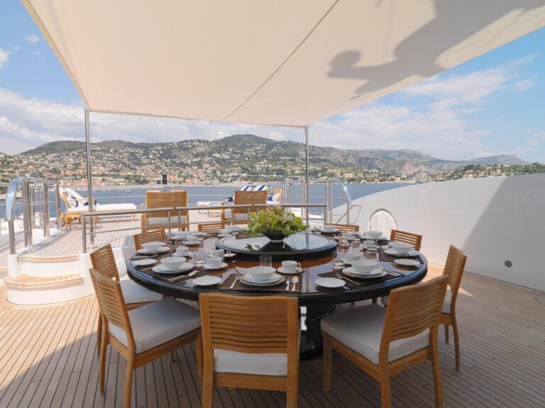 sundeck dining area with a set up for a luxury breakfast or relaxing lunch