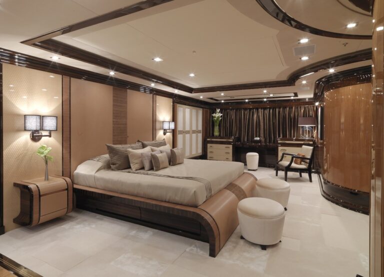 master suite with luxury amenities and office / study area
