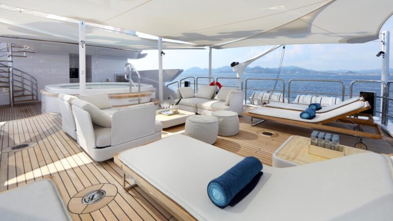 Sundeck Jacuzzi with sunbeds and seating