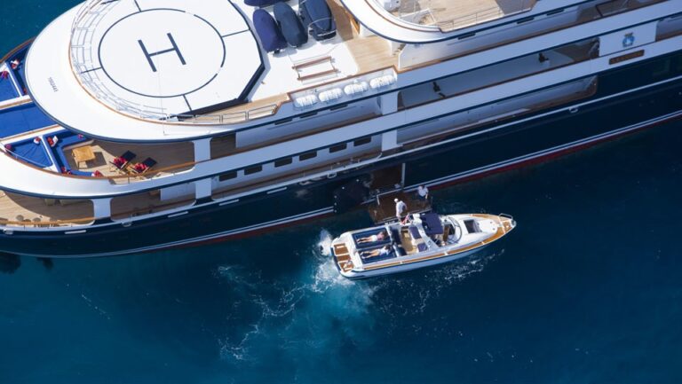 Ship's Tender Alongside On Yacht LEANDER G