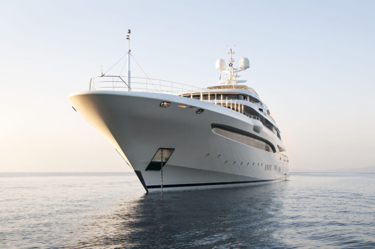 Bow View Of O'PTASIA At Sunset