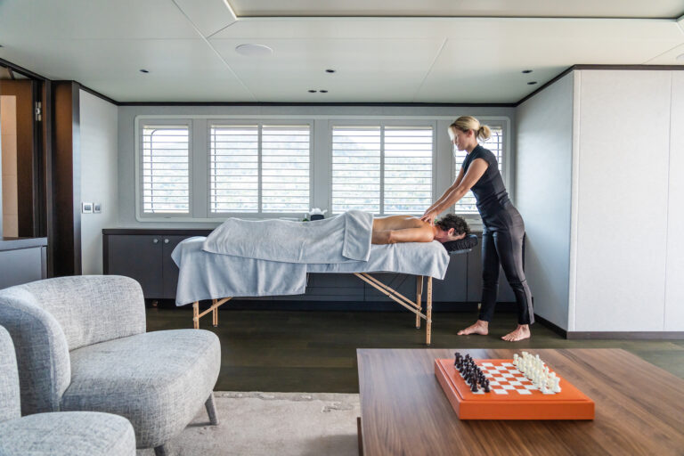 Enjoying A Massage Aboard A Yacht