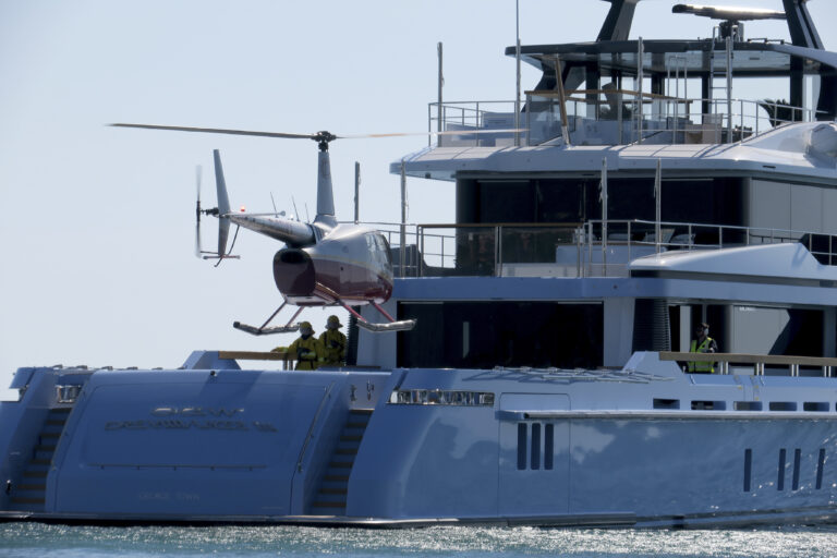 Exterior With Helicopter - Stern