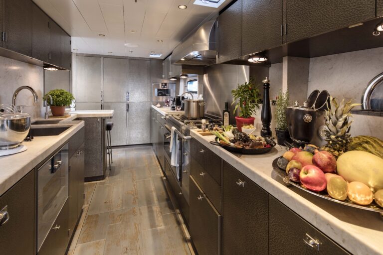 Food Preparation In The Galley Of Sailing Yacht PINK GIN VI