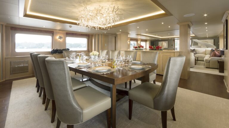 Formal Dining Area With Beautiful Light Fitting
