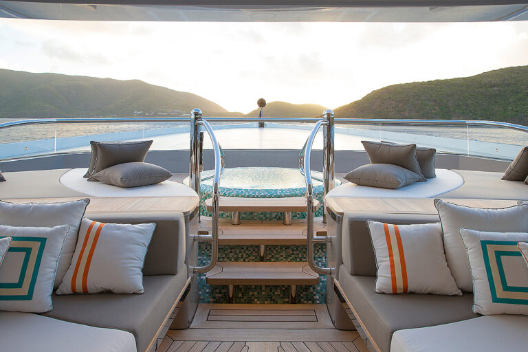 Jacuzzi And Pool With Sunpads