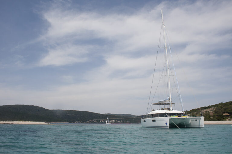 Lagoon Sailing Yacht EAGLE OF NORWAY - Anchored In A Bay