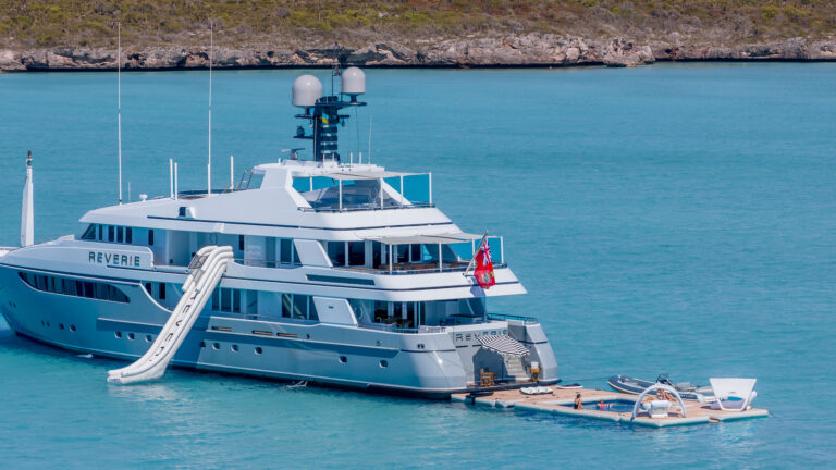 Luxury Yacht REVERIE At Anchor With The Inflatable Pool And Sunbathing Area