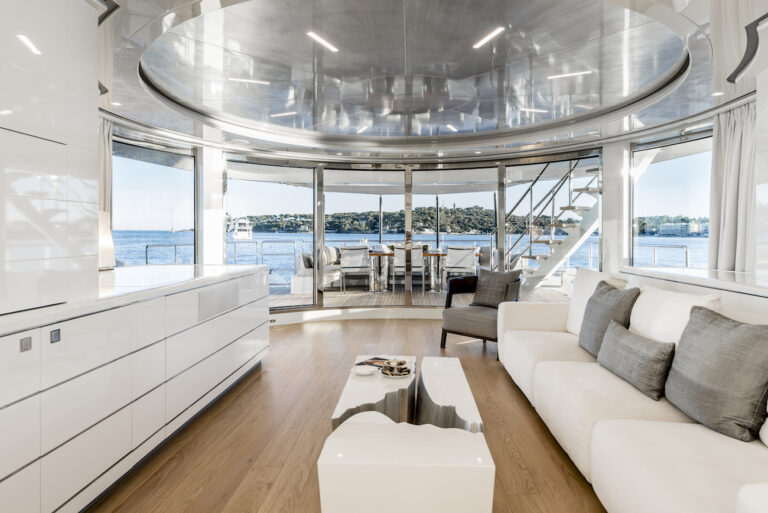 Main Saloon With The View Aft Onto The Exterior Deck Area