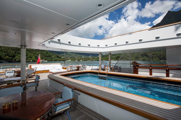 Massive Swimming Pool And Aft Deck With Bar And Seating