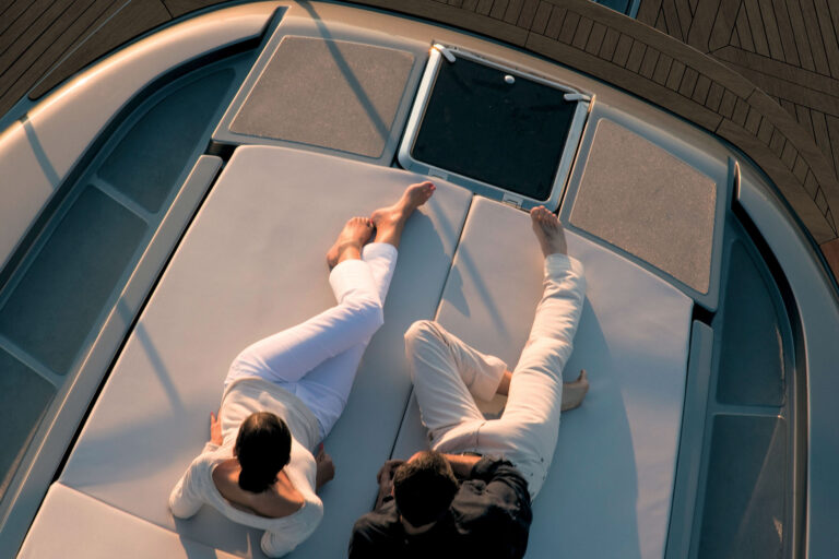 Relaxing On The Foredeck Sunpads