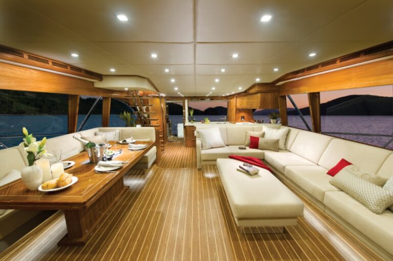 The 75 superyacht aft galley and saloon with L-shaped lounge