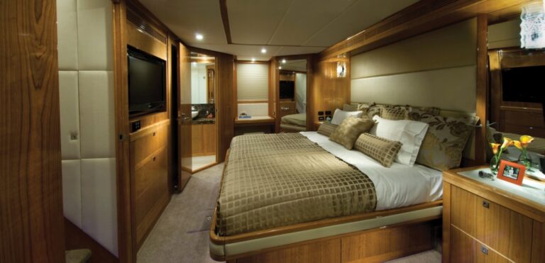 The 75 superyacht master stateroom with full beam king-sized bed