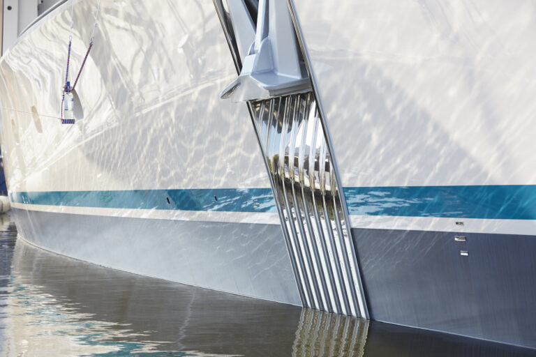 The Teal-coloured Waterline Of Superyacht SAMAYA