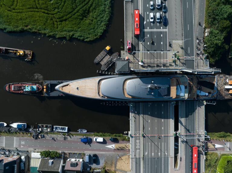 Aerial View Passing A Bridge