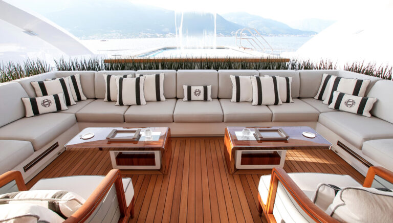 Aft Deck Lounging With A Pool In The Background
