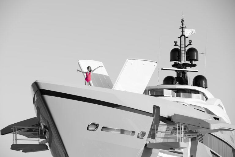 Model On A Bow Of A Mega Yacht