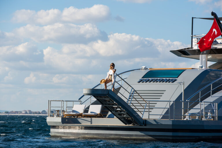 Model On A Passarelle Of A Yacht