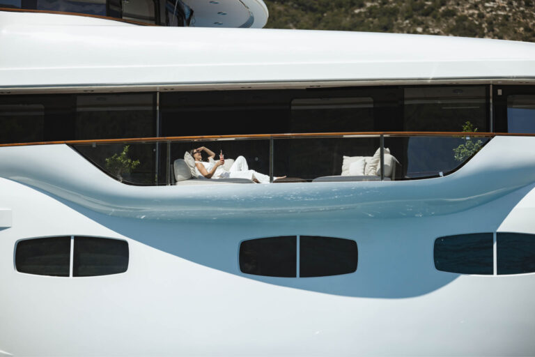 Relaxing On A Balcony On A Yacht