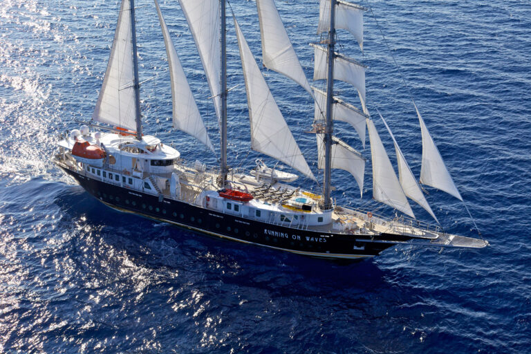 Sailing Yacht Running On Waves
